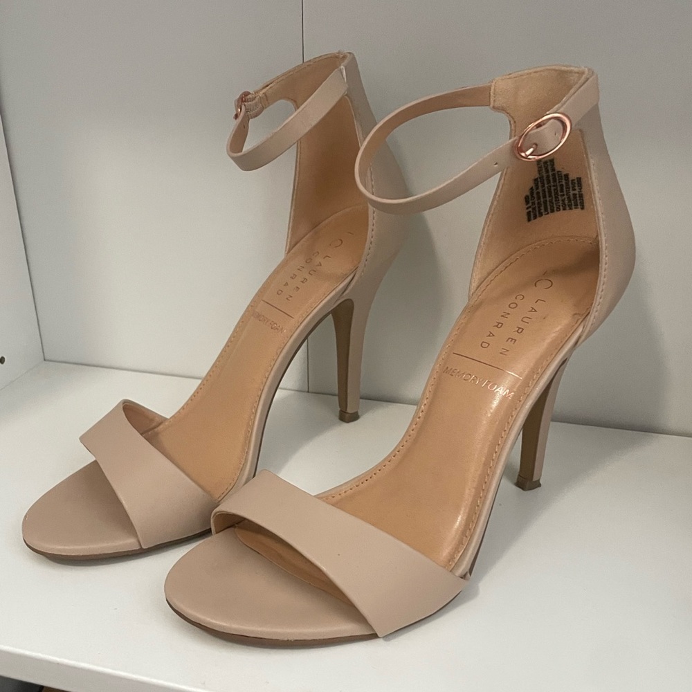 Nude heels with ankle strap. Buckle is rose gold. Lauren Conrad with memory foam